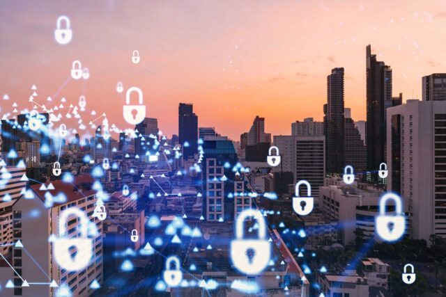 Hologram of Padlock on sunset panoramic cityscape of Bangkok, Southeast Asia. The concept of cyber security intelligence. Multi exposure.